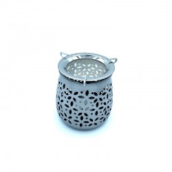 Metal resin incense burner with esoteric candle.