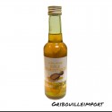 Bottle of mustard oil for hair and body.