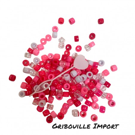 Perles roses pour tresses cheveux d'enfants.